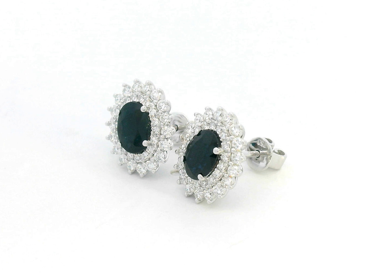 18K white gold earrings with oval blue sapphires (2.12ct) and double diamond halos (0.84ct total)