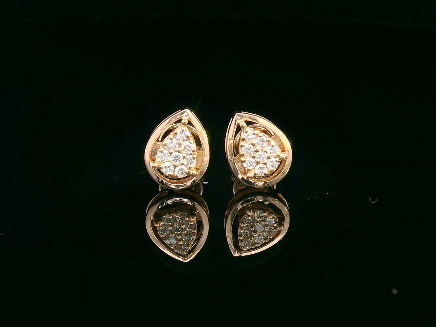 18K gold teardrop stud earrings with 0.15 carat diamond cluster