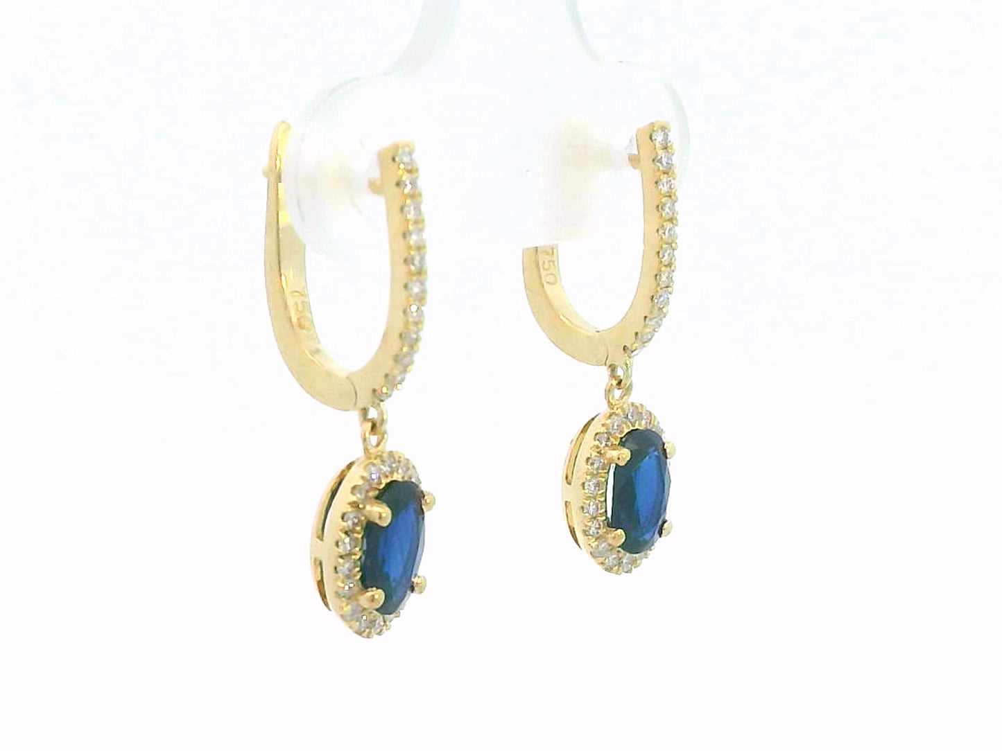 Elegant 18K gold drop earrings with 0.98ct oval blue sapphires and 0.26ct diamond halo and hoop design