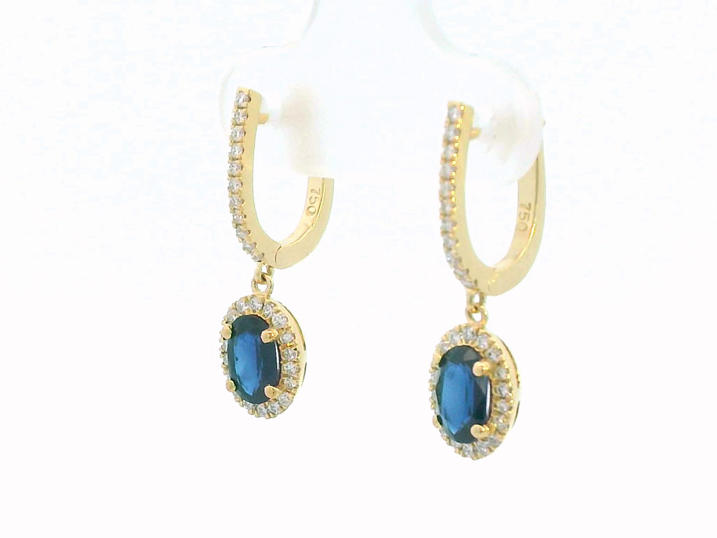Elegant 18K gold drop earrings with 0.98ct oval blue sapphires and 0.26ct diamond halo and hoop design