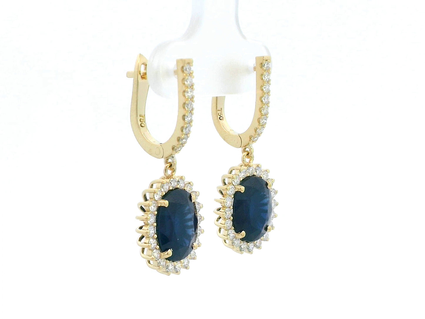 18K yellow gold earrings with 6.41ct oval blue sapphires and 0.91ct diamond sunburst halo design