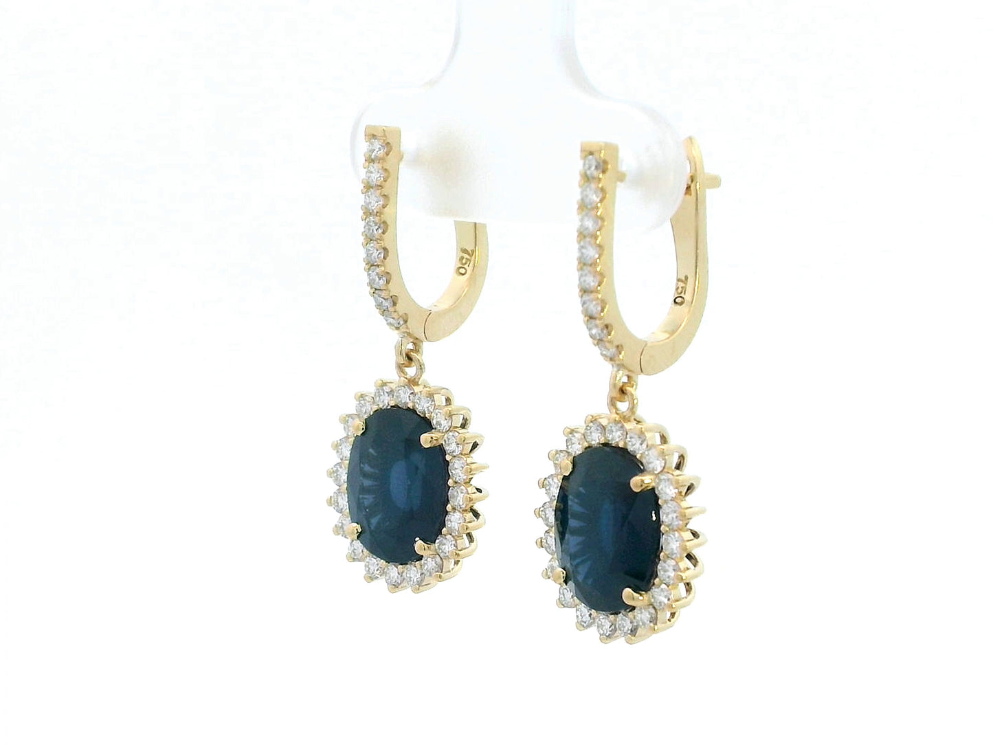 18K yellow gold earrings with 6.41ct oval blue sapphires and 0.91ct diamond sunburst halo design