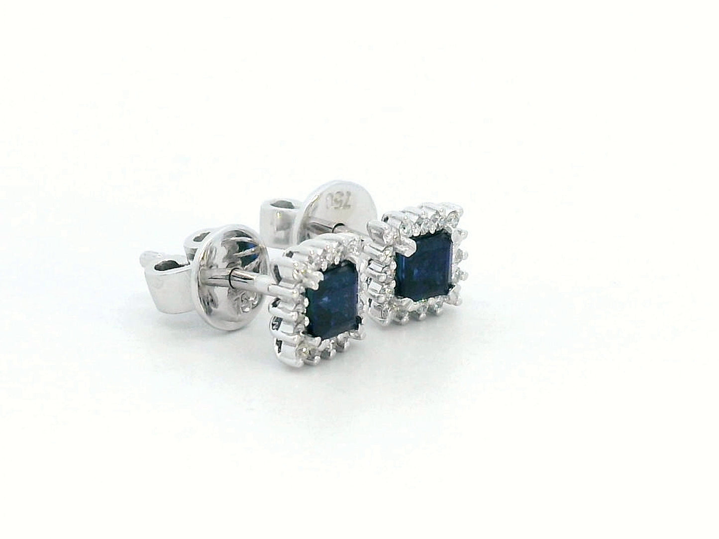 Square-cut sapphire halo stud earrings in 18K white gold with diamond accents