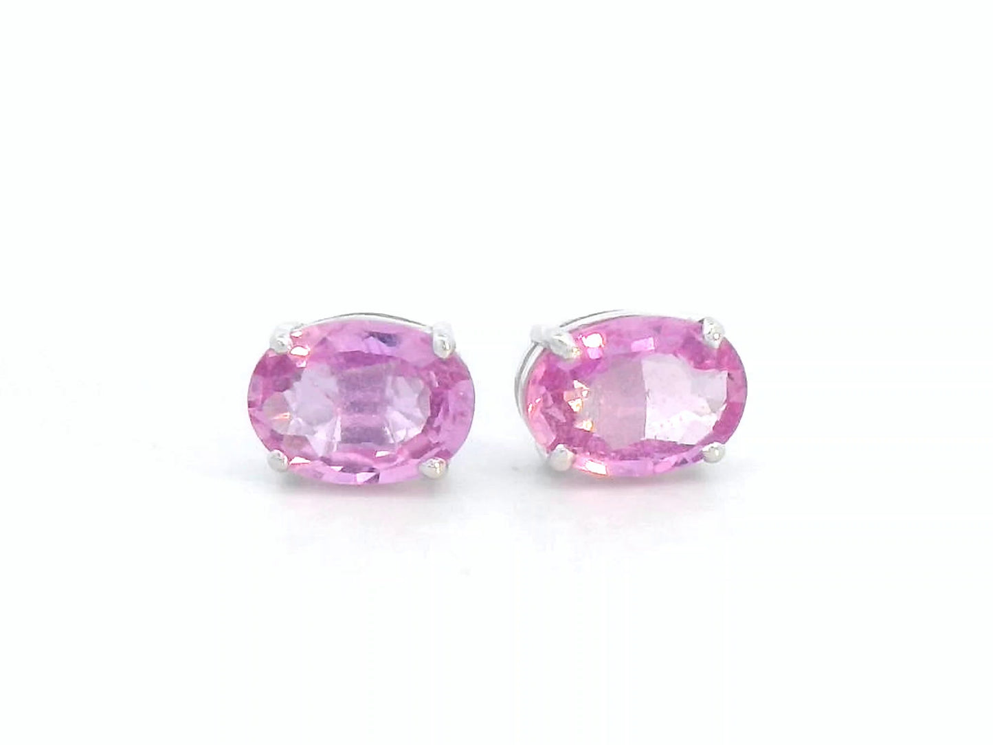 18K white gold stud earrings set with 1.66 carat pink sapphires