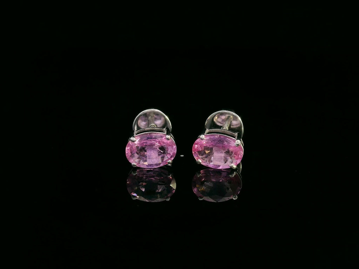 18K white gold stud earrings set with 1.66 carat pink sapphires
