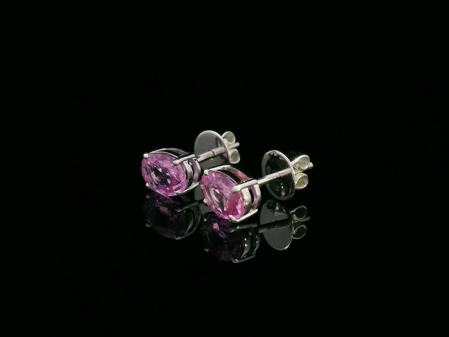 18K white gold stud earrings set with 1.66 carat pink sapphires