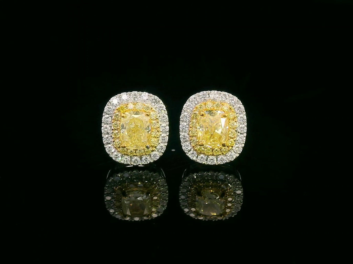 18K gold fancy yellow diamond halo stud earrings with white diamond border – Emirates Diamonds