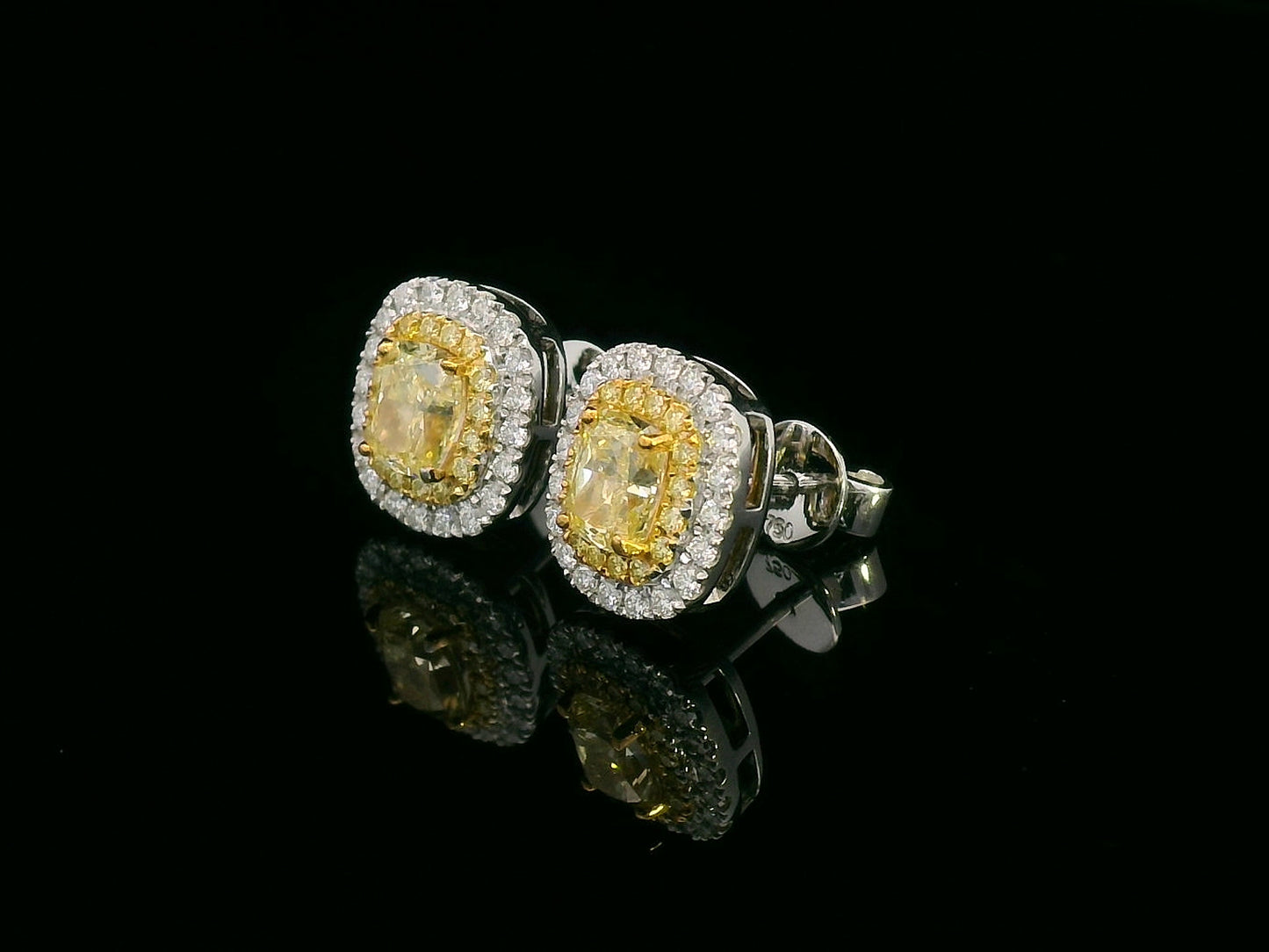 18K gold fancy yellow diamond halo stud earrings with white diamond border – Emirates Diamonds