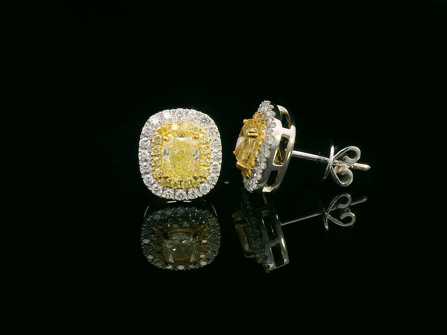 18K gold fancy yellow diamond halo stud earrings with white diamond border – Emirates Diamonds
