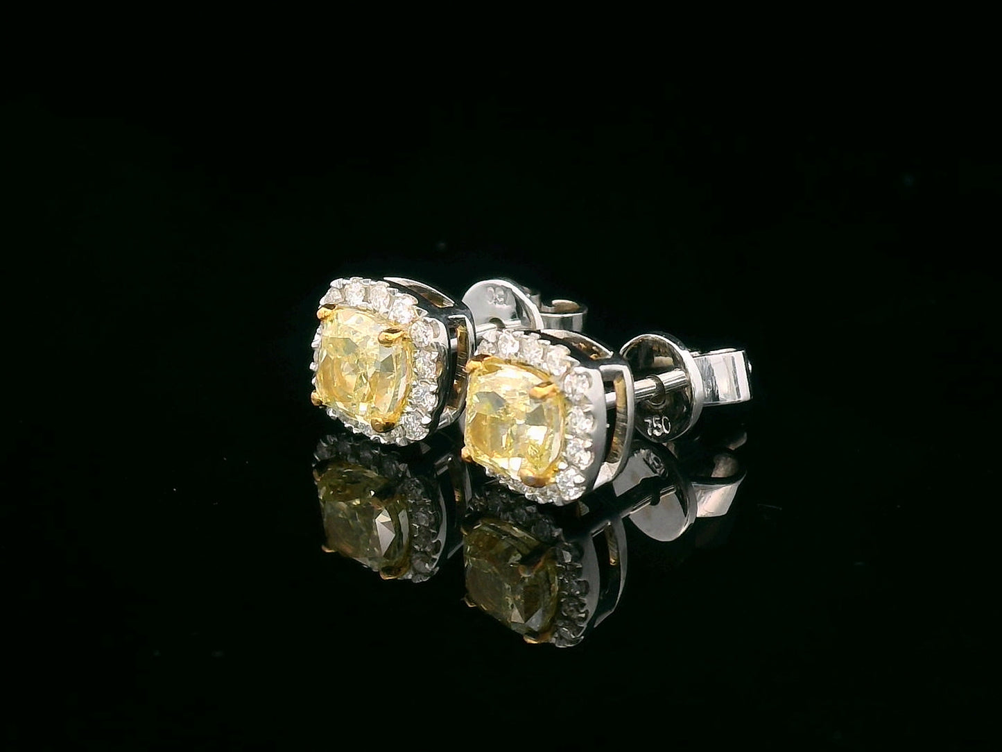 Cushion-Cut Fancy Yellow Diamond Stud Earrings with White Diamond Halo in 18K White Gold