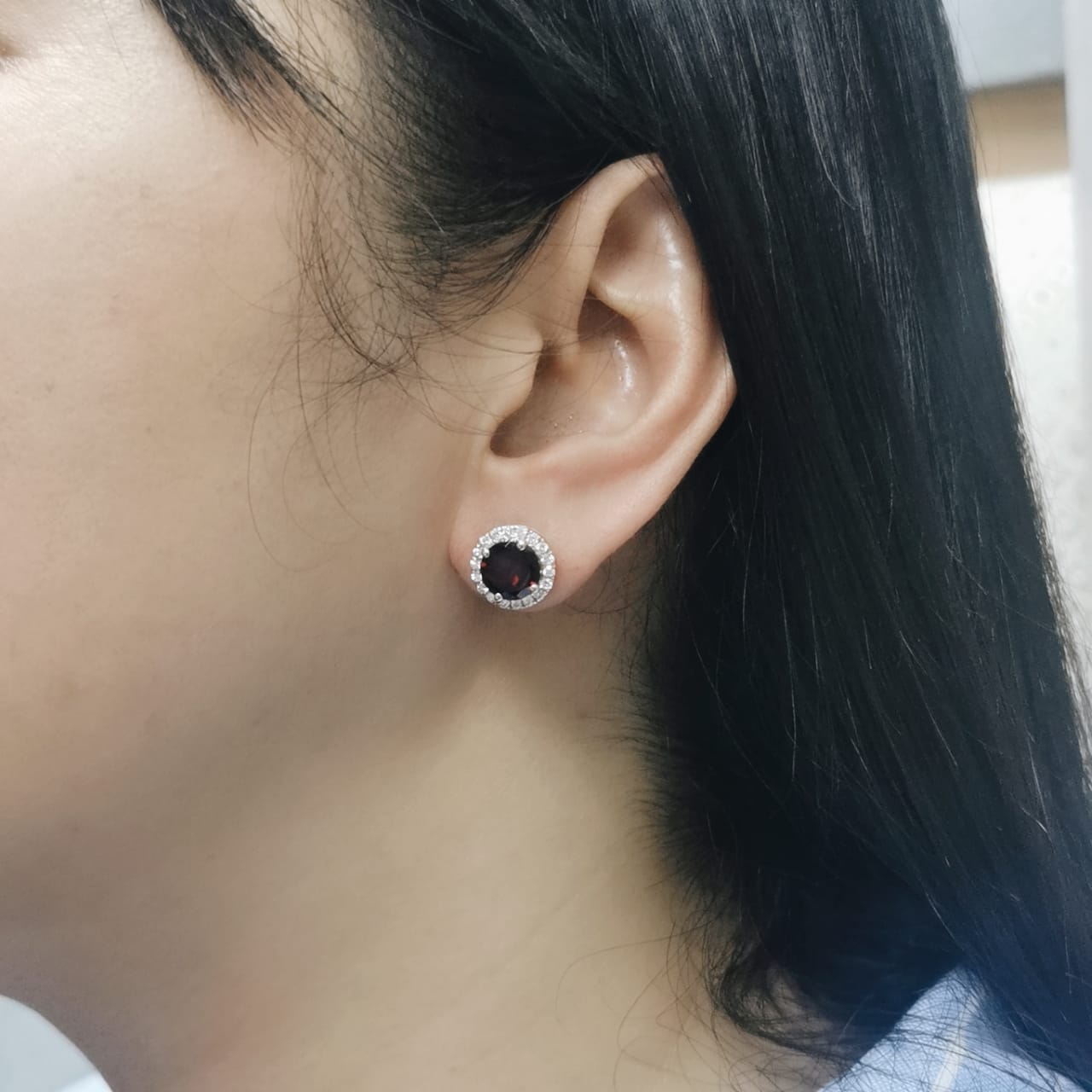 Round garnet and diamond halo stud earrings in 18K rose gold, birthstone jewelry for January