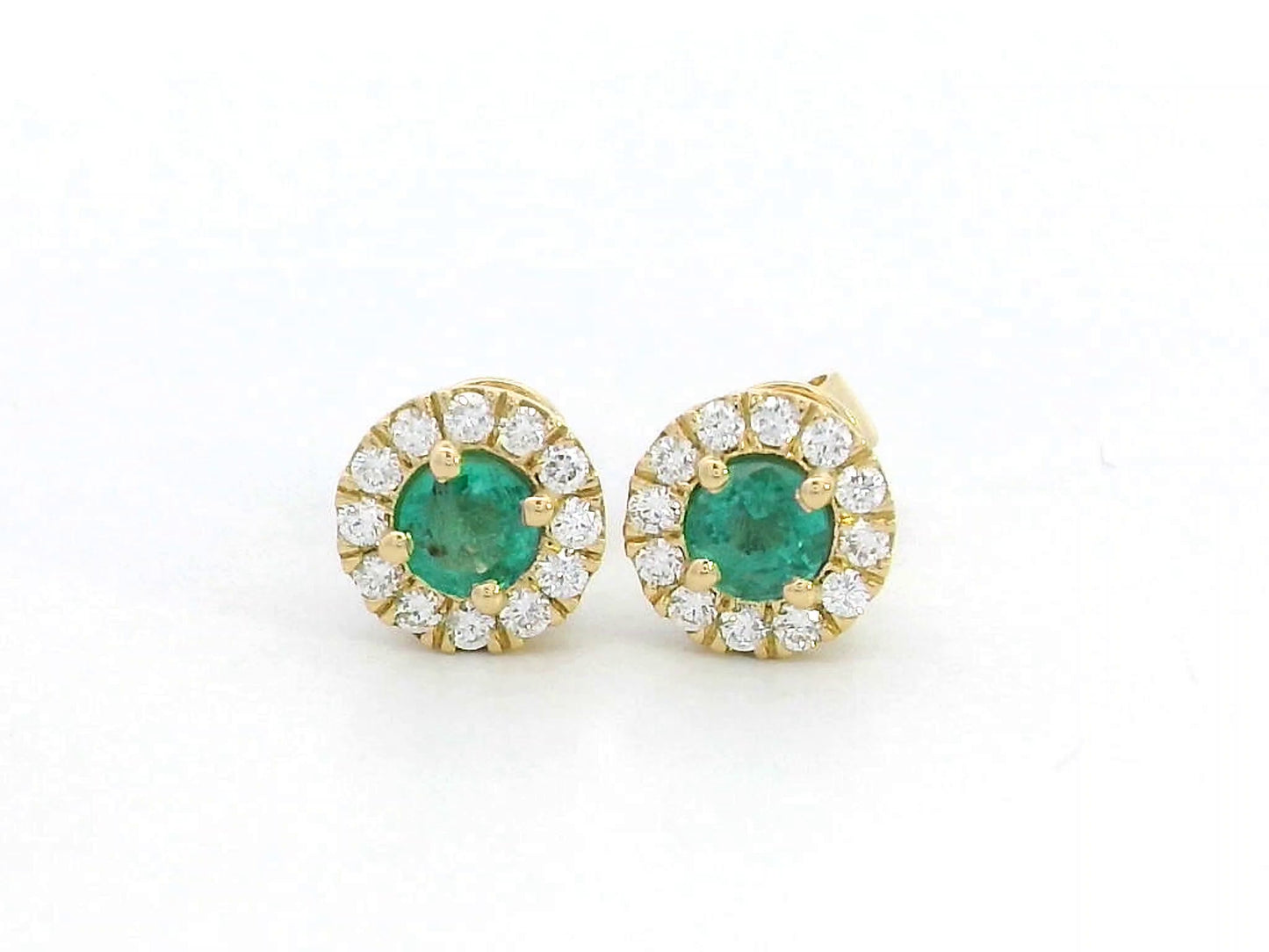 Dainty 18K gold stud earrings with round-cut emeralds and diamond halos