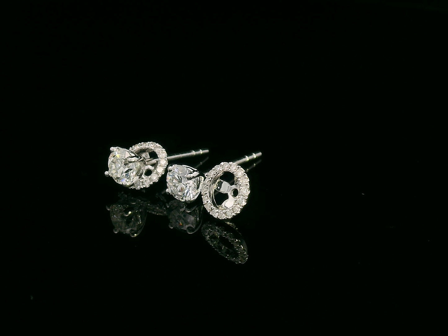 Convertible diamond stud earrings in 18K white gold with detachable halo setting, 0.61 carat total weight