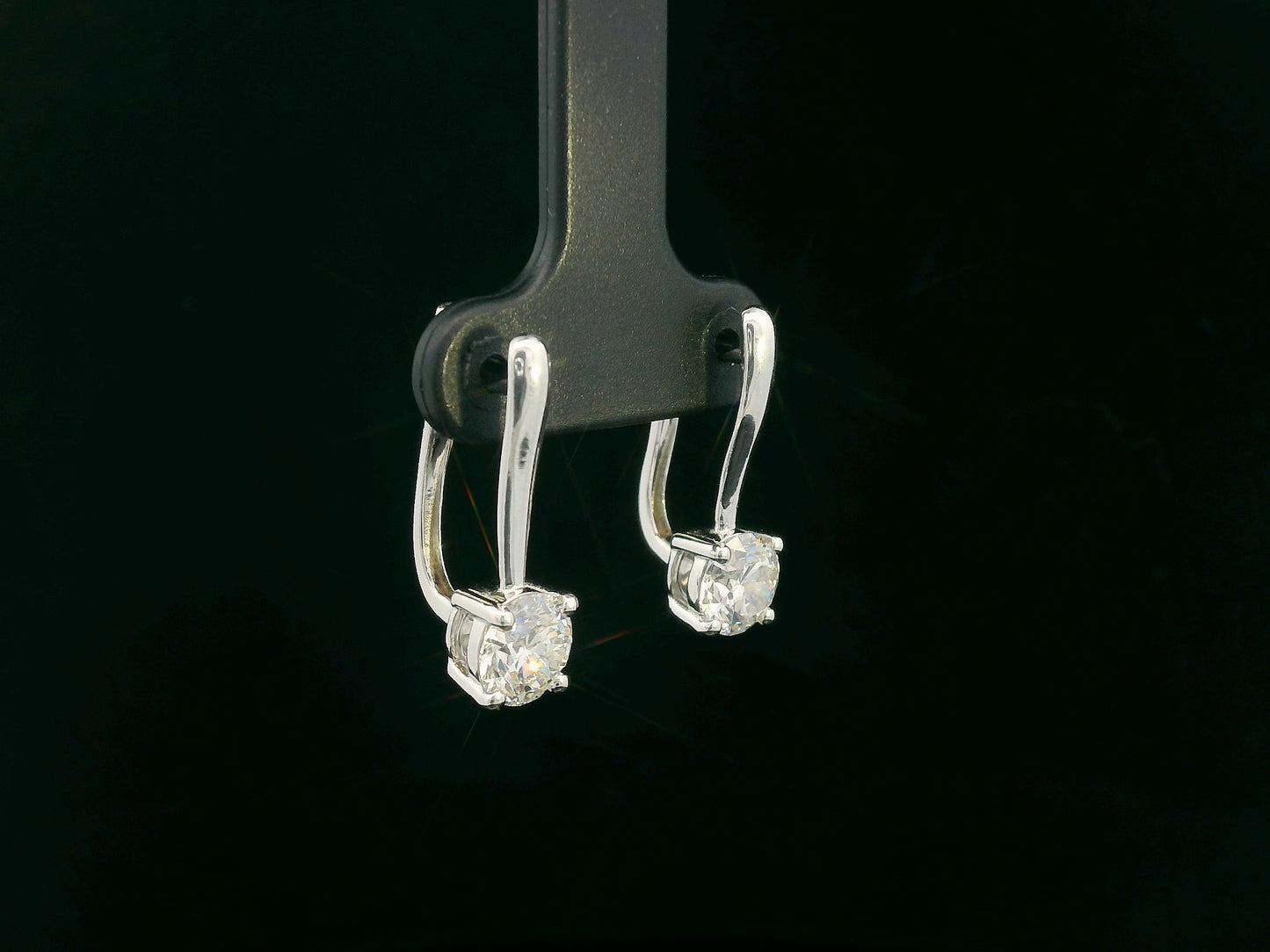 18K white gold diamond drop earrings with 1.01ct and 1.02ct round-cut GIA-certified diamonds in four-prong setting