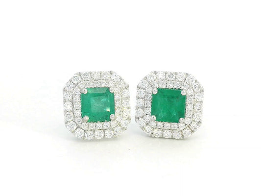 Square-cut emerald stud earrings with double diamond halo in 18K white gold – 1.19ct emeralds and 0.65ct diamonds
