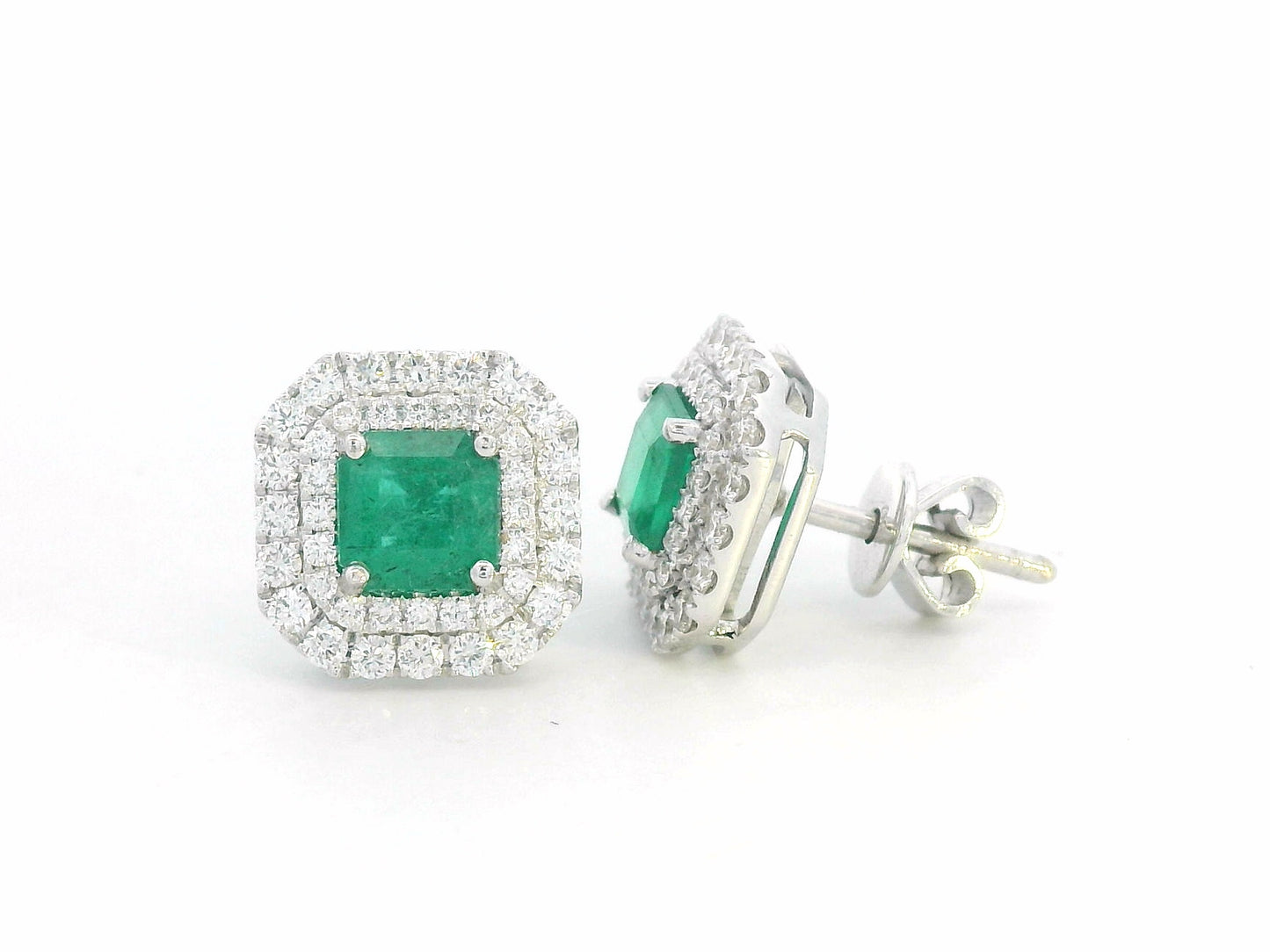 Square-cut emerald stud earrings with double diamond halo in 18K white gold – 1.19ct emeralds and 0.65ct diamonds