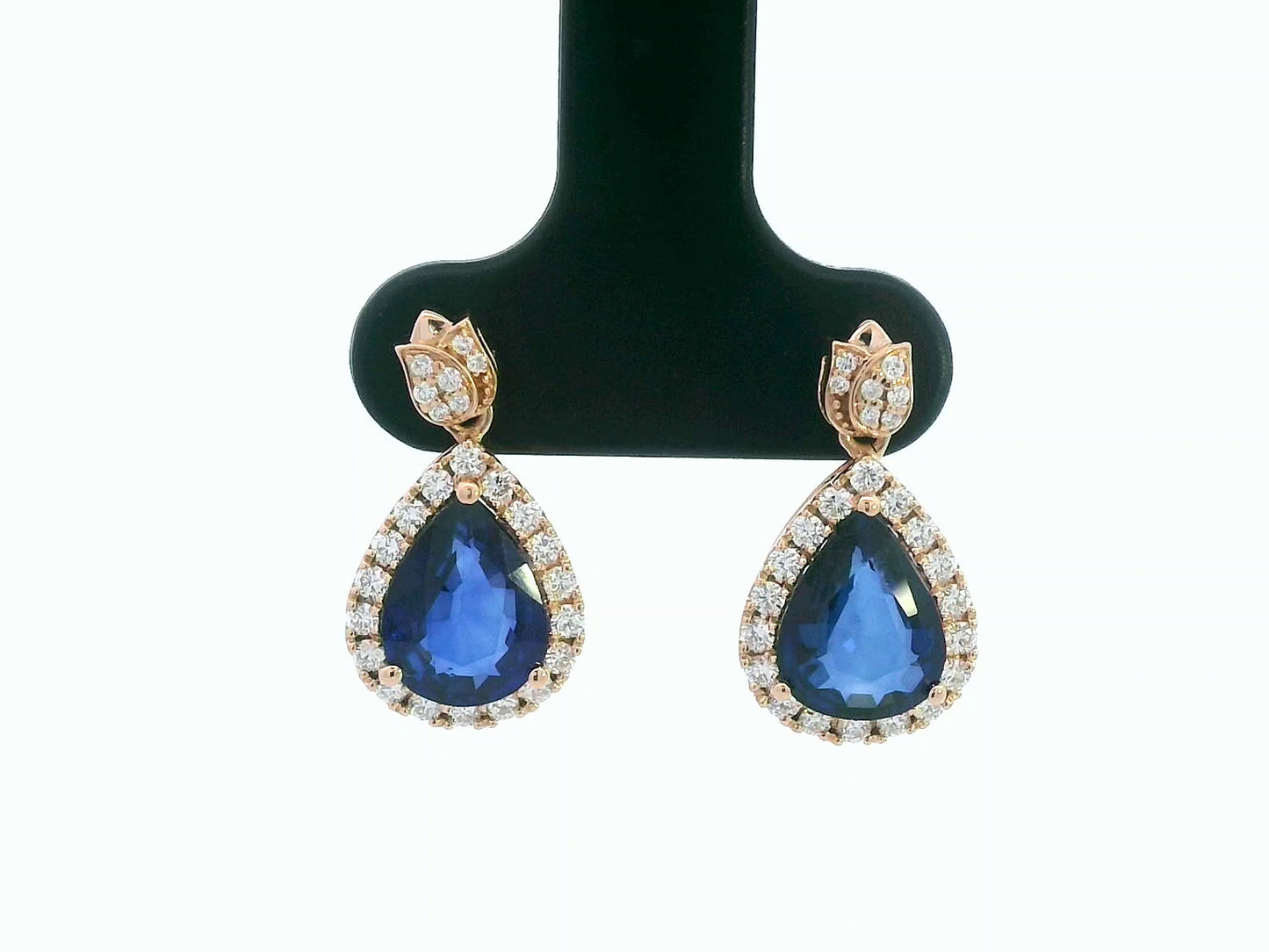 18K rose gold pear-shaped blue sapphire drop earrings with diamond halo and tulip motif