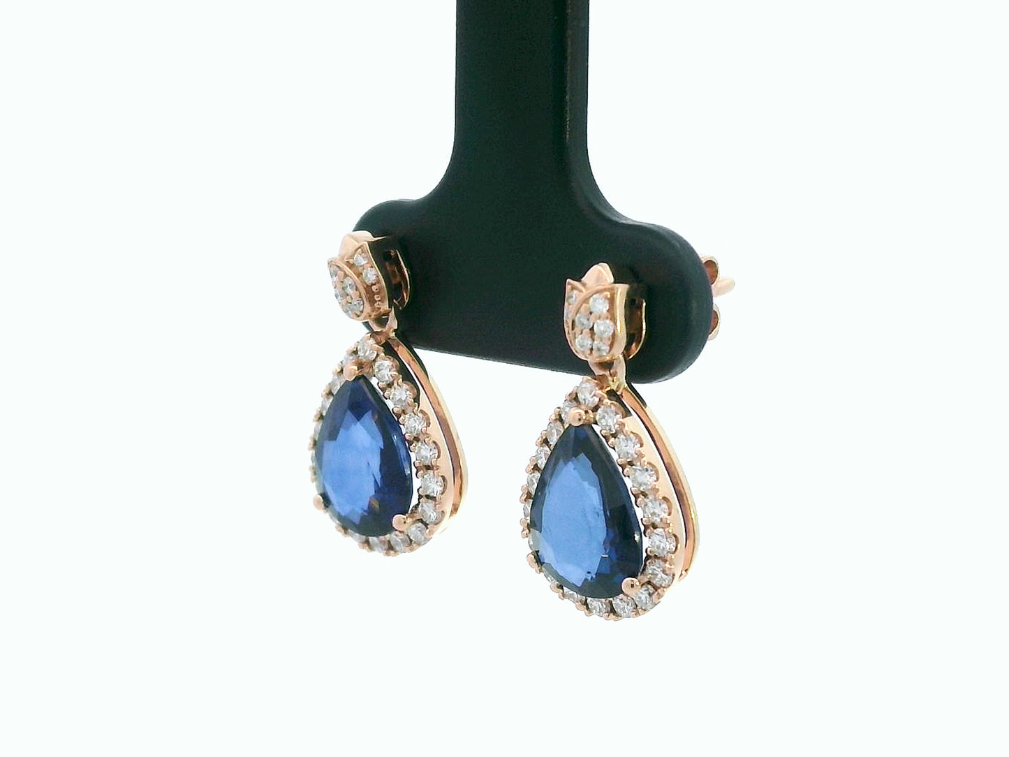 18K rose gold pear-shaped blue sapphire drop earrings with diamond halo and tulip motif