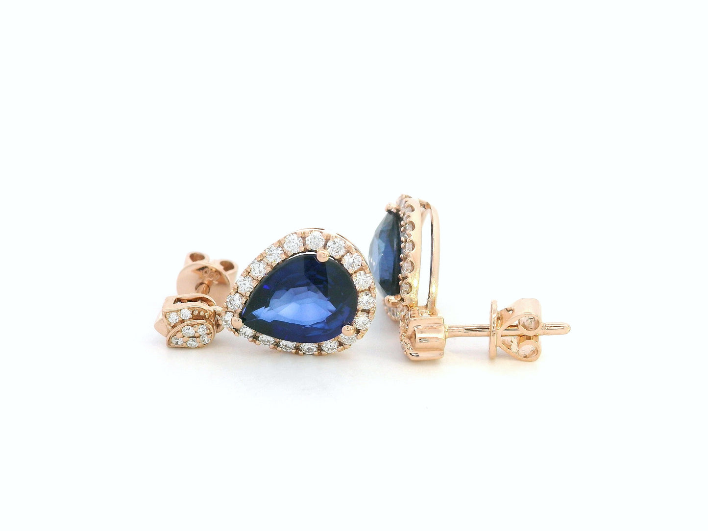 18K rose gold pear-shaped blue sapphire drop earrings with diamond halo and tulip motif
