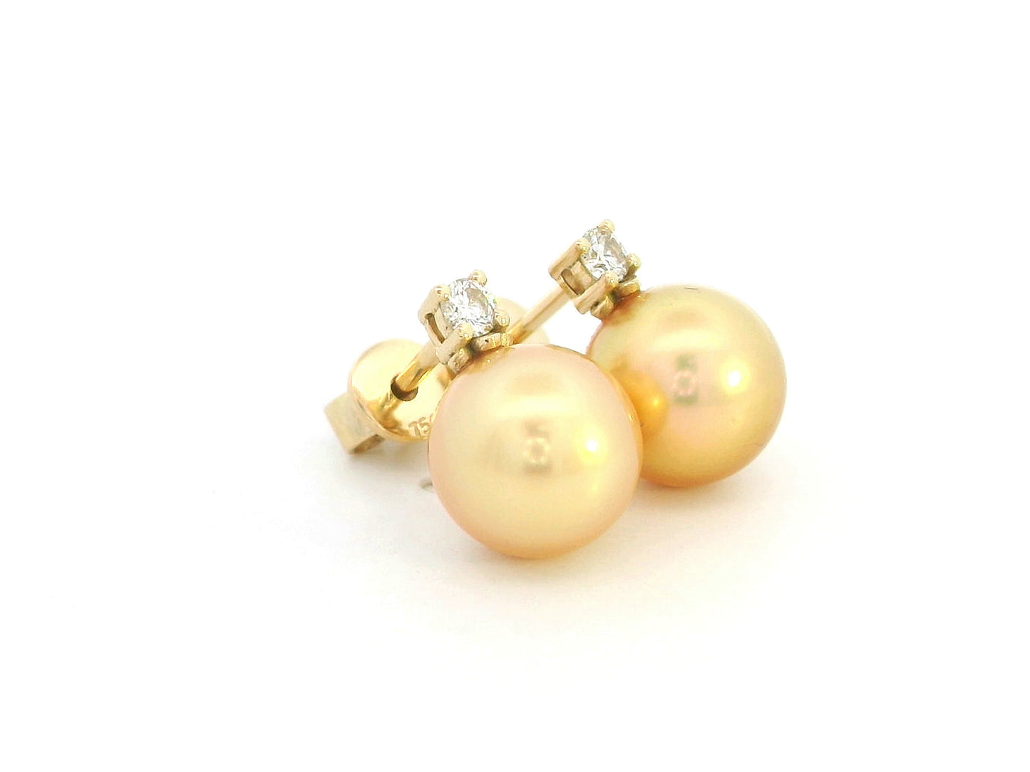 Yellow gold stud earrings featuring golden pearls and diamonds