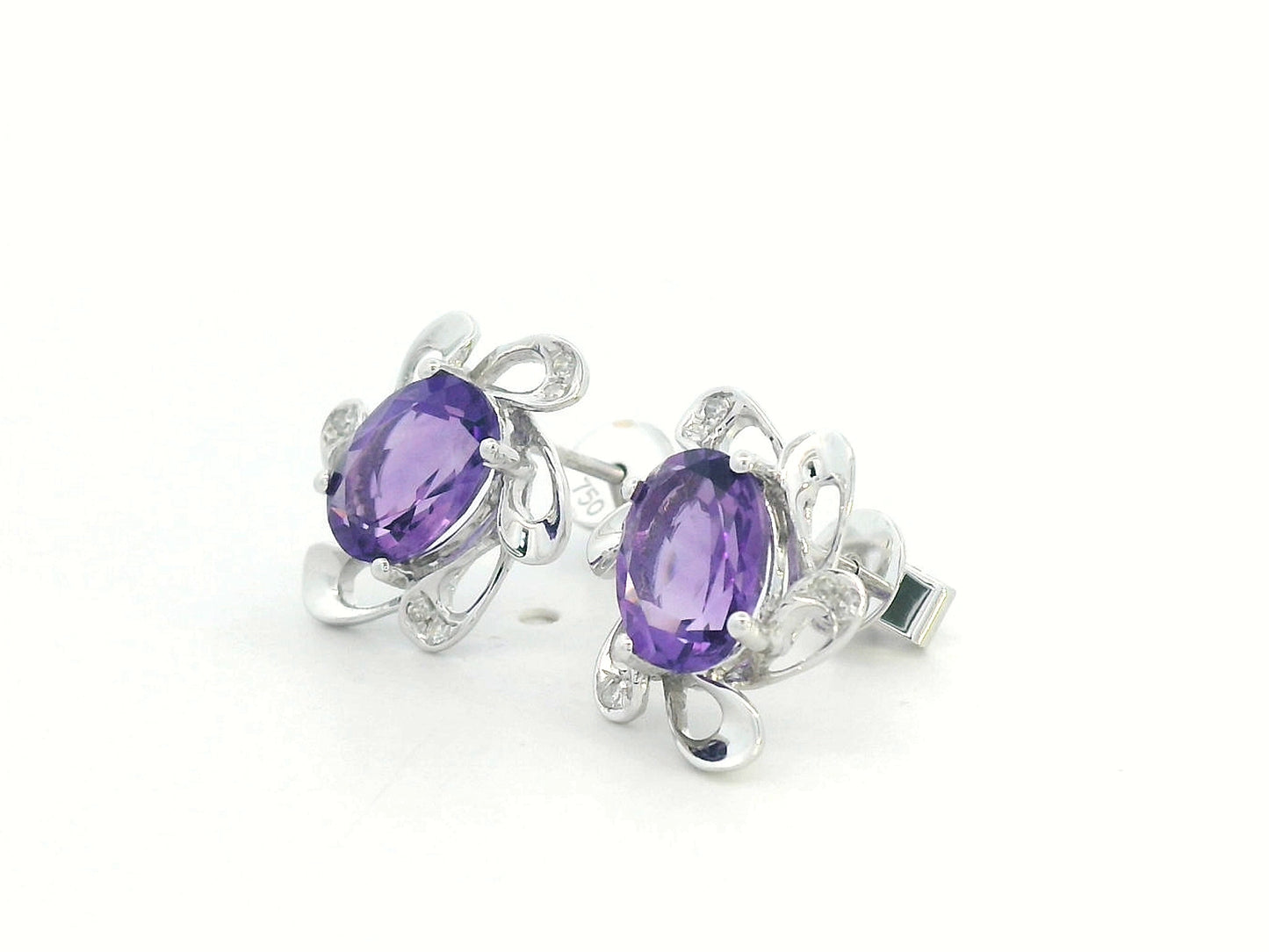 8K white gold amethyst stud earrings with oval purple gemstones and diamond halo in floral setting, elegant fine jewelry
