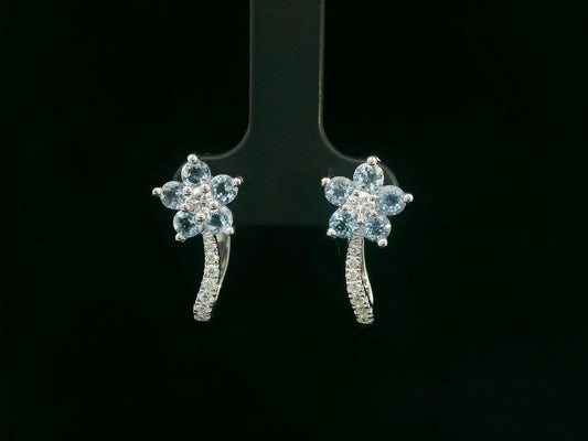18K white gold floral hoop earrings with aquamarine clusters and diamond accents, total 1.43 carat