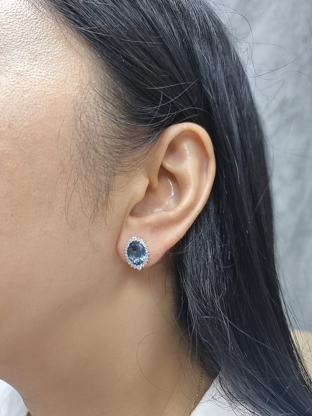 18k white gold London Blue Topaz and diamond halo earrings