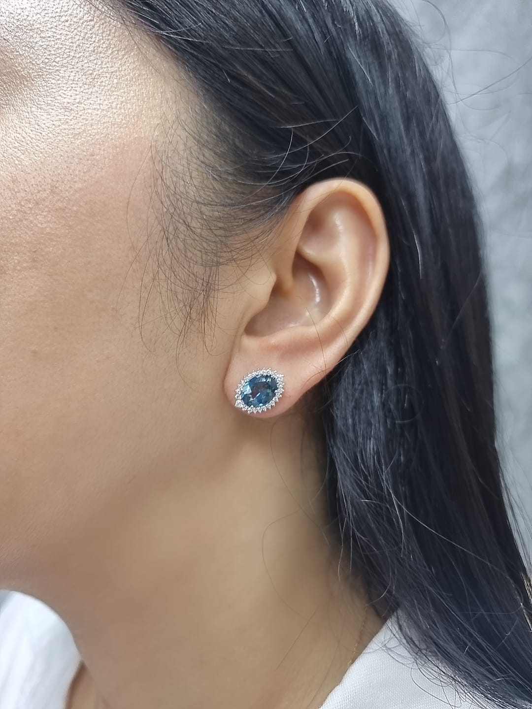 18k white gold London Blue Topaz and diamond halo earrings
