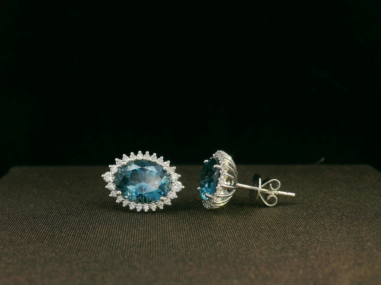 18k white gold London Blue Topaz and diamond halo earrings