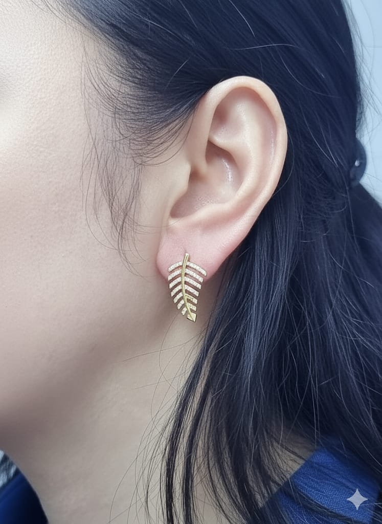18K yellow gold leaf-shaped stud earrings with pavé diamonds, nature-inspired elegant design