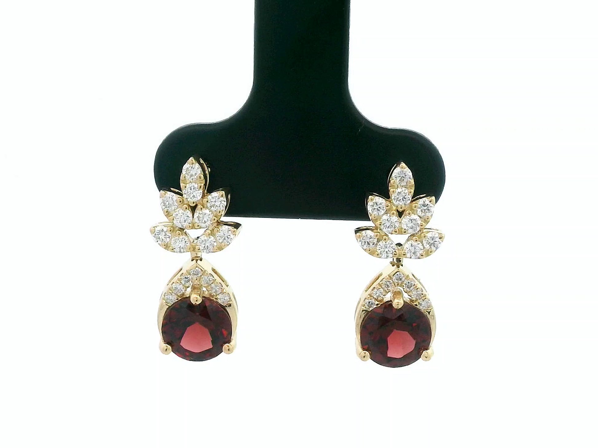 18K yellow gold leaf earrings with a toatl of 1.93ct round cut  garnets and 0.41ct pavé diamonds