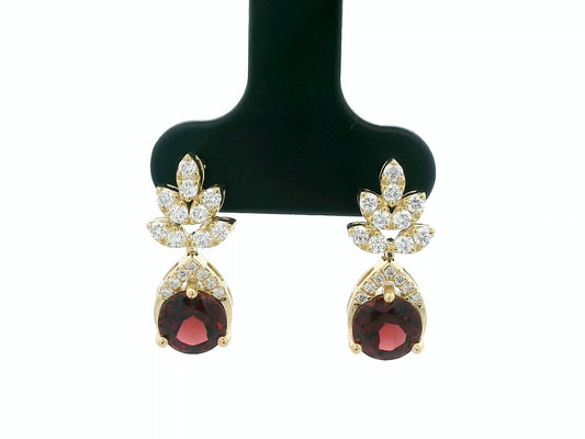 18K yellow gold leaf earrings with a toatl of 1.93ct round cut  garnets and 0.41ct pavé diamonds