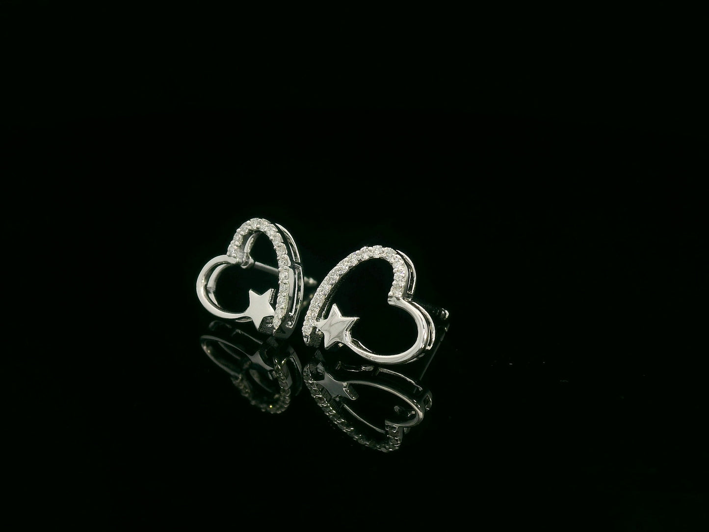 Diamond heart and star earrings in 18K white gold by Emirates Diamonds