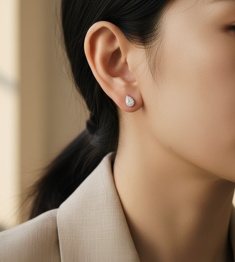 Pear-shaped diamond halo stud earrings in 18K white gold — Emirates Diamonds