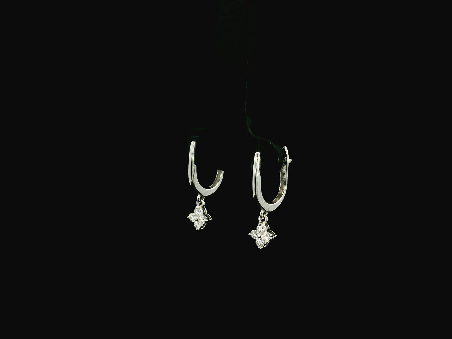 Minimal diamond drop earrings in 18K gold with round brilliant diamonds