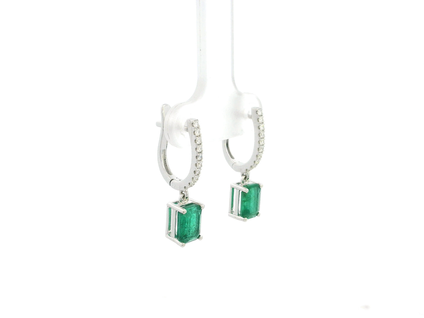 Emerald cut emerald drop earrings with diamond hoops in 18K white gold