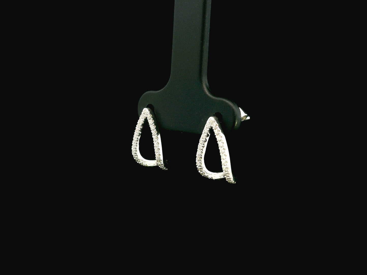 18K white gold diamond teardrop earrings featuring 0.25 carat natural diamonds in an elegant open teardrop design with butterfly push back closures.