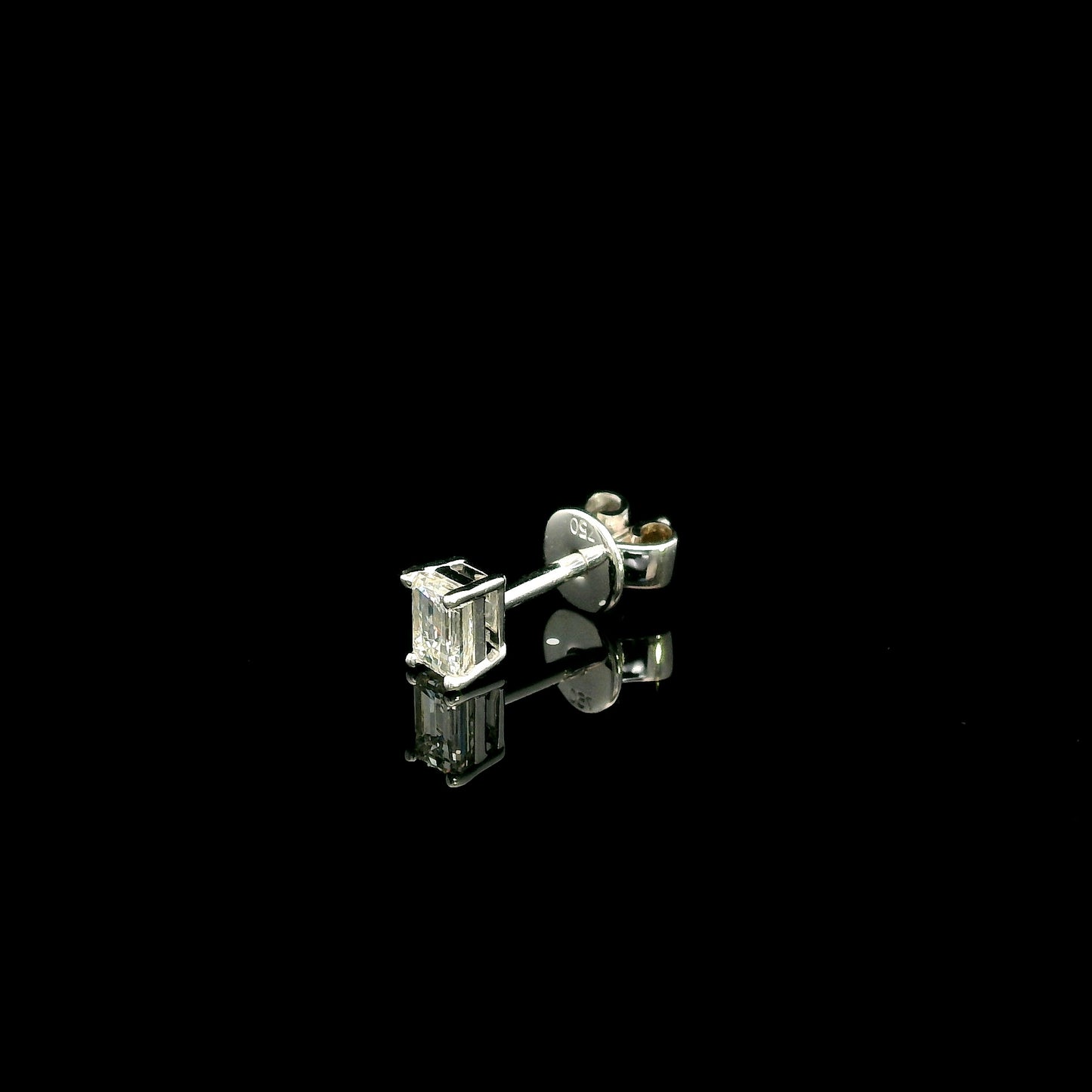 Emerald cut diamond single stud earring in 18K white gold with 0.25 carat natural diamond