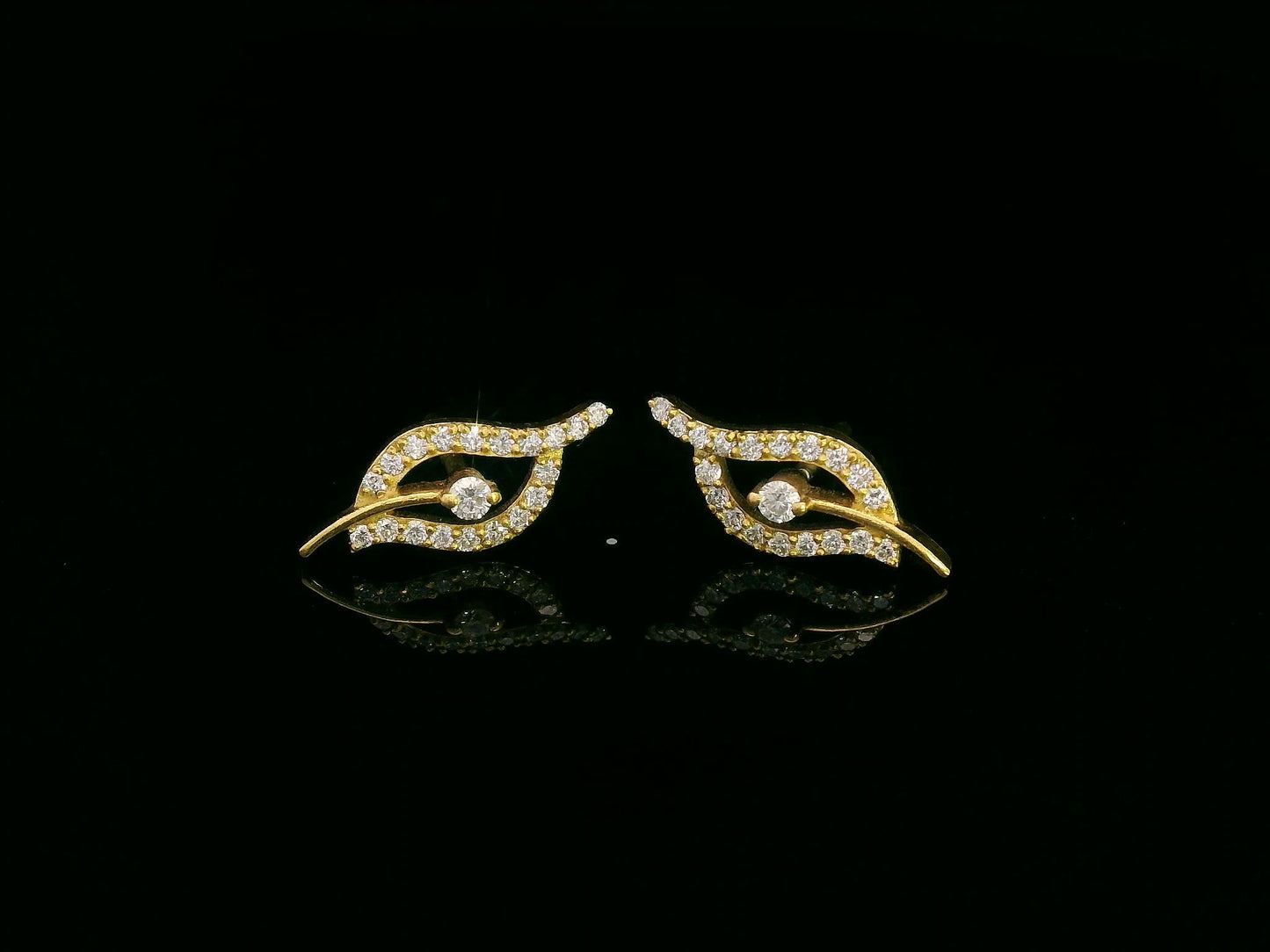 18K gold leaf-shaped stud earrings with 0.31 carats of natural diamonds, featuring a delicate openwork design and a secure butterfly backing.