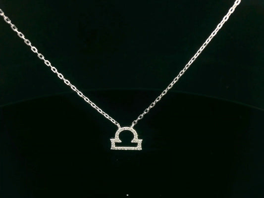 Libra zodiac pendant necklace in 18K gold with 0.09 carat diamonds on fine chain
