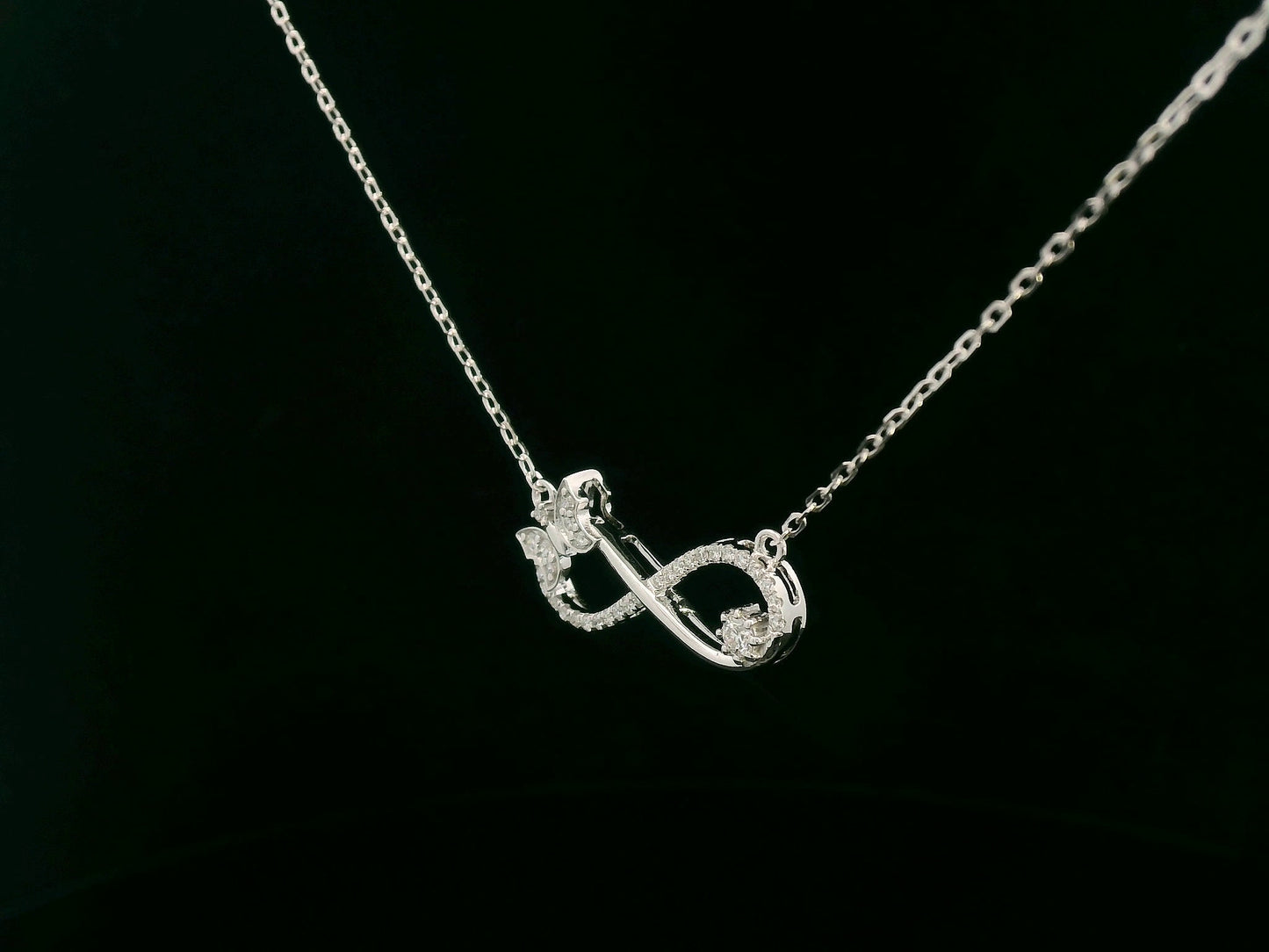 18K White Gold Diamond Infinity Bow Necklace, 0.23 Carat Round Diamonds, Elegant Symbolic Pendant