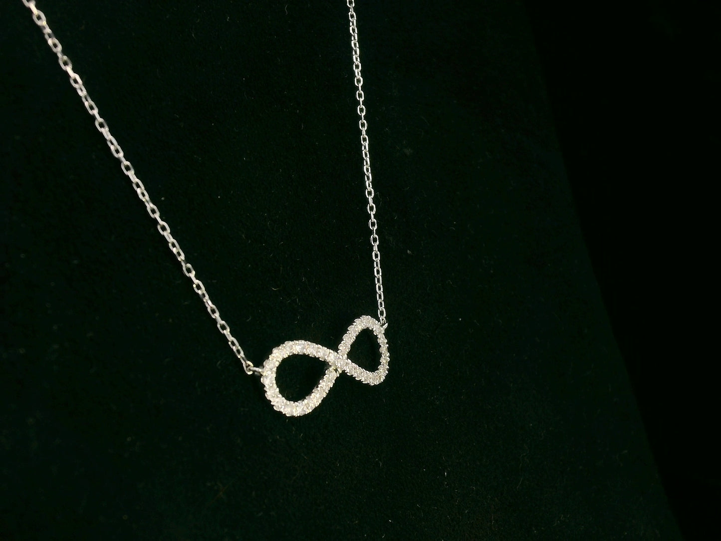 18K white gold infinity necklace with pavé-set natural diamonds – Emirates Diamonds