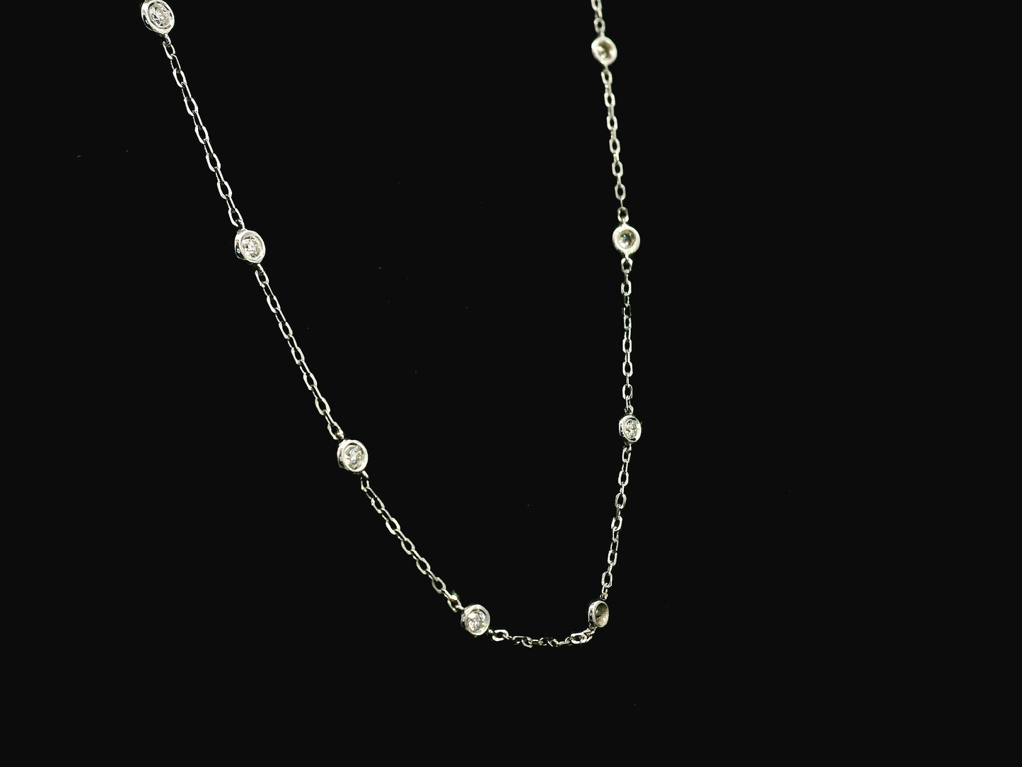 Diamond station necklace in 18K white gold with 0.60ct bezel-set diamonds – Emirates Diamonds