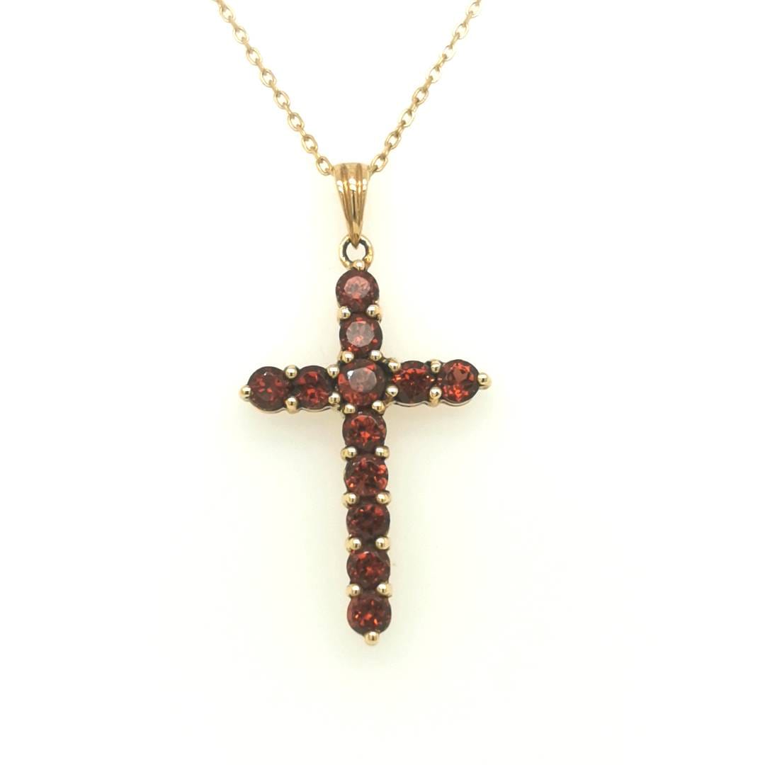 Garnet Cross Pendant In 18k Yellow Gold.
