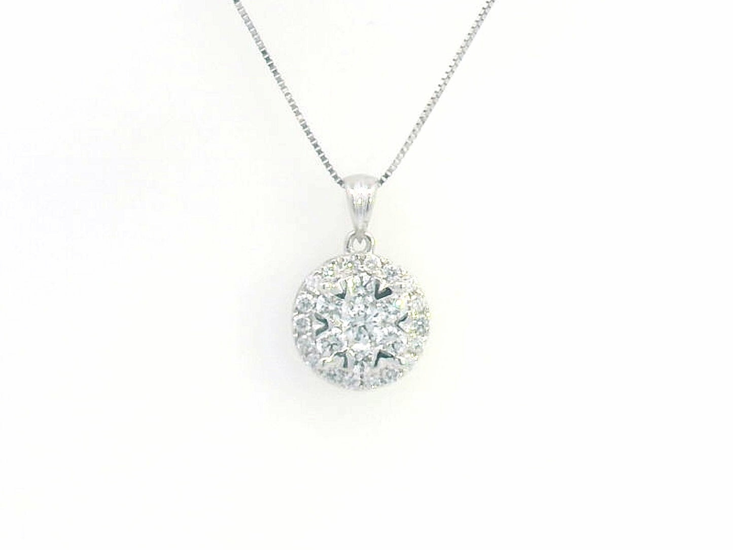 18K gold round diamond cluster pendant featuring 0.45-carat natural diamonds in an elegant fine jewelry setting. Chain not included; contact us to choose your preferred chain length and style.