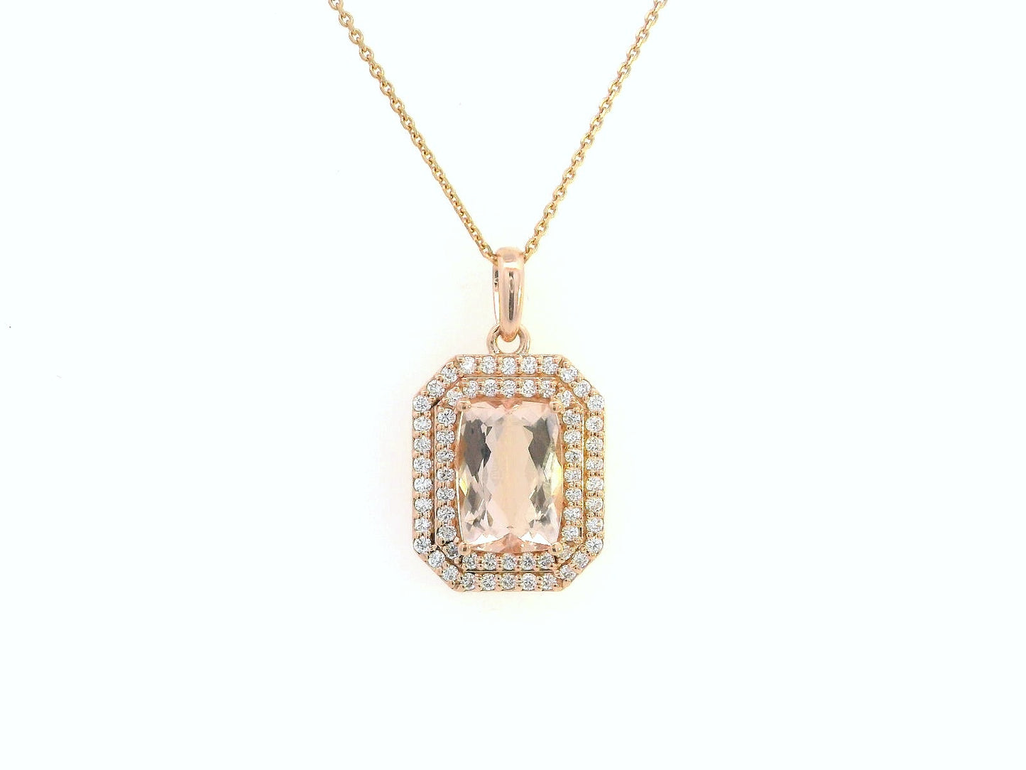 18K gold emerald-cut morganite pendant featuring a 2.18-carat blush pink morganite with a double halo of 0.40-carat diamonds. Luxury fine jewelry piece.