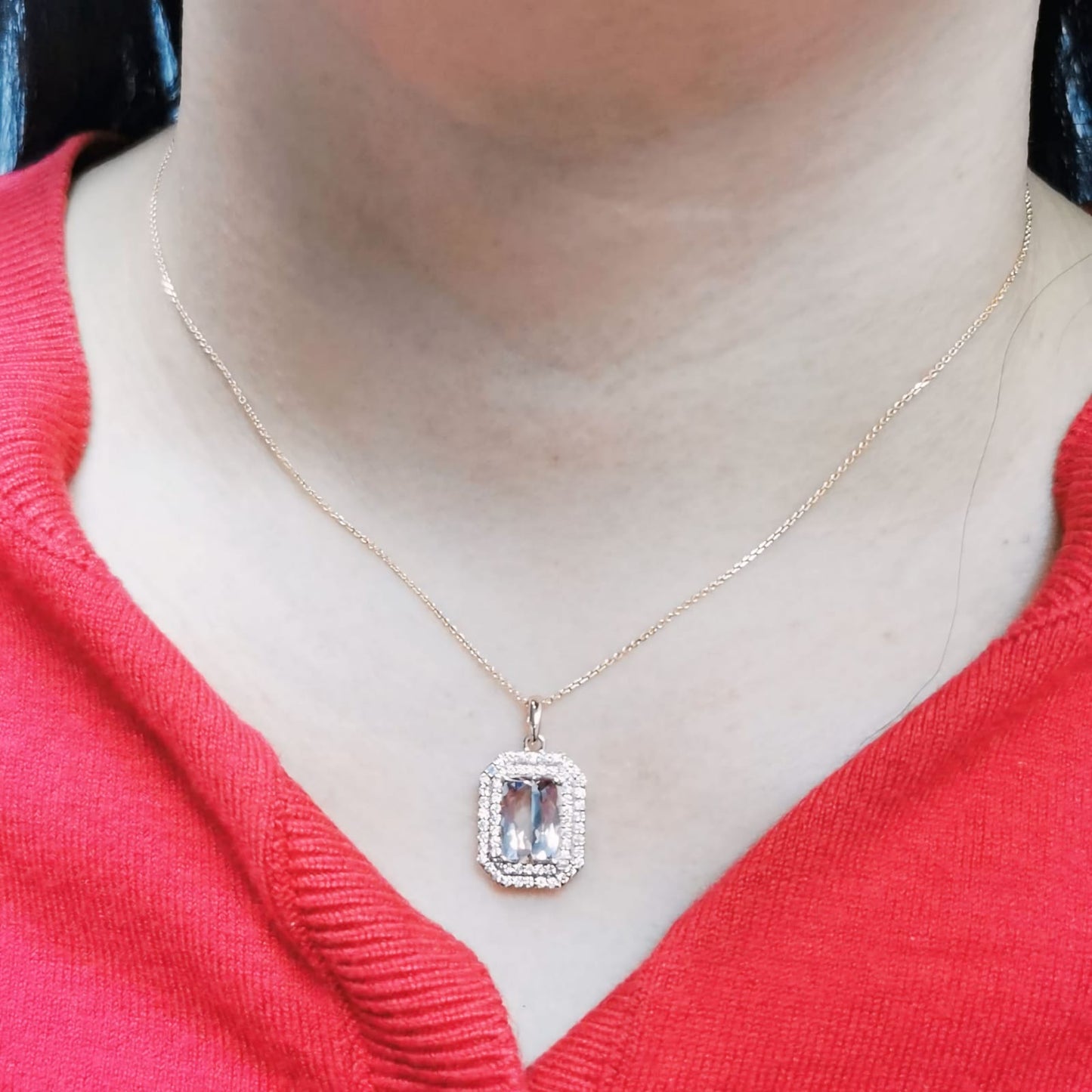 18K gold emerald-cut morganite pendant featuring a 2.18-carat blush pink morganite with a double halo of 0.40-carat diamonds. Luxury fine jewelry piece.