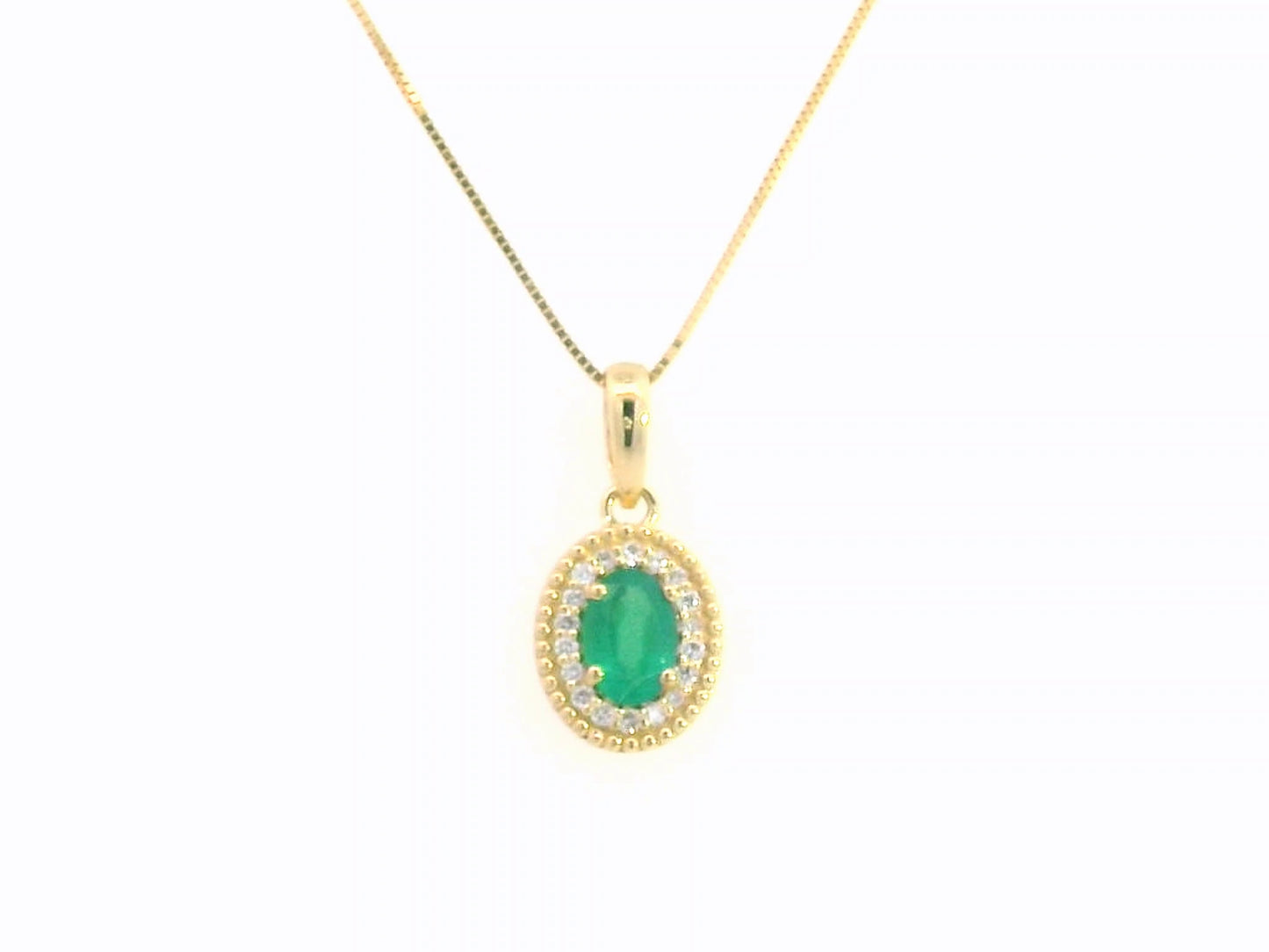 Oval-Cut Emerald & Diamond Halo Pendant in 18K Gold