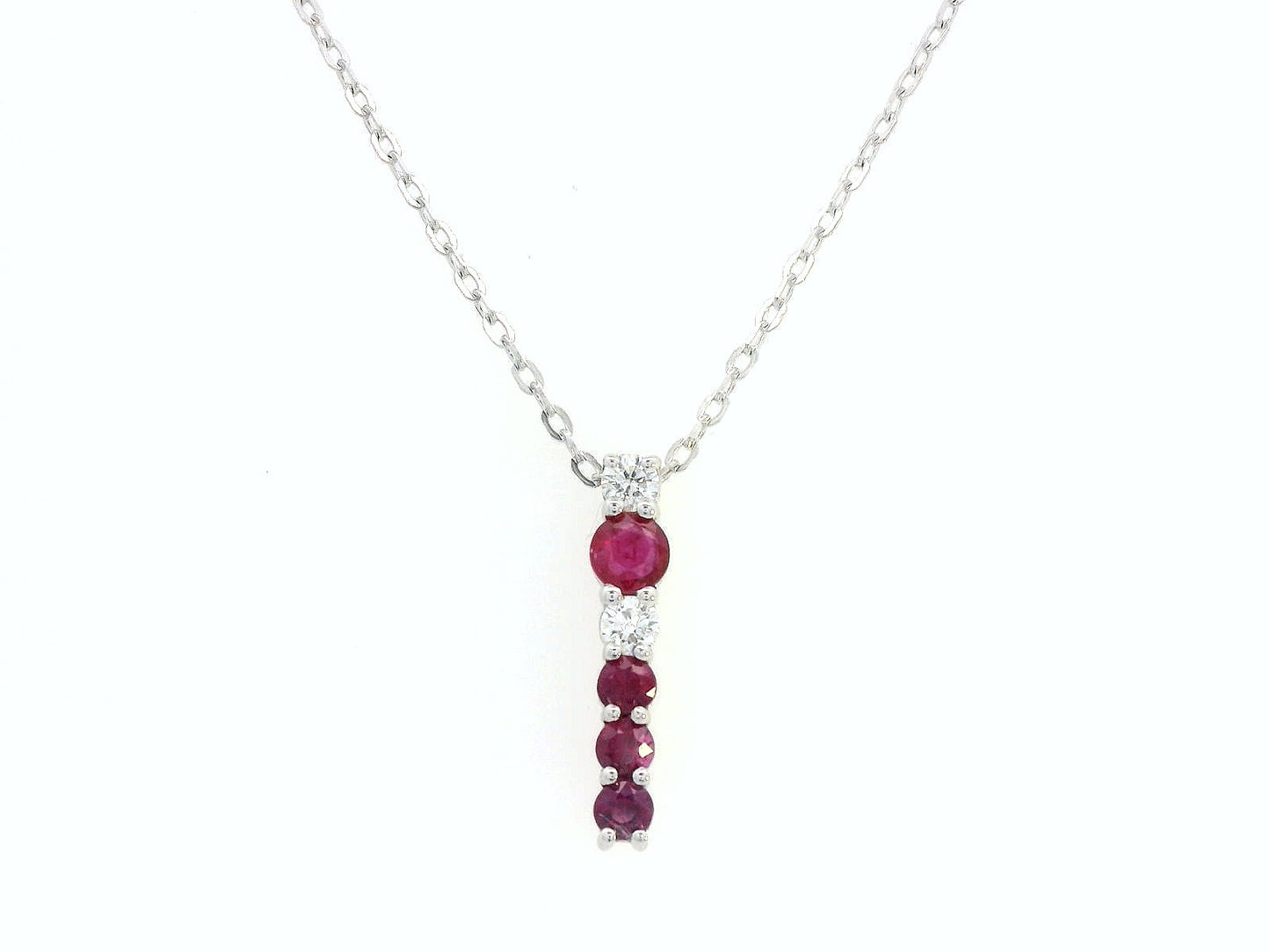18K gold ruby and diamond vertical bar pendant necklace, featuring 0.50 carats of rubies and 0.13 carats of diamonds – dainty July birthstone jewelry for women.