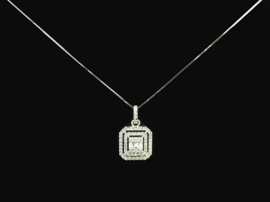 18K gold diamond pendant featuring baguette and round-cut diamonds, totaling 0.50ct, with a radiant double halo design.